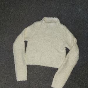 White fuzzy sweater